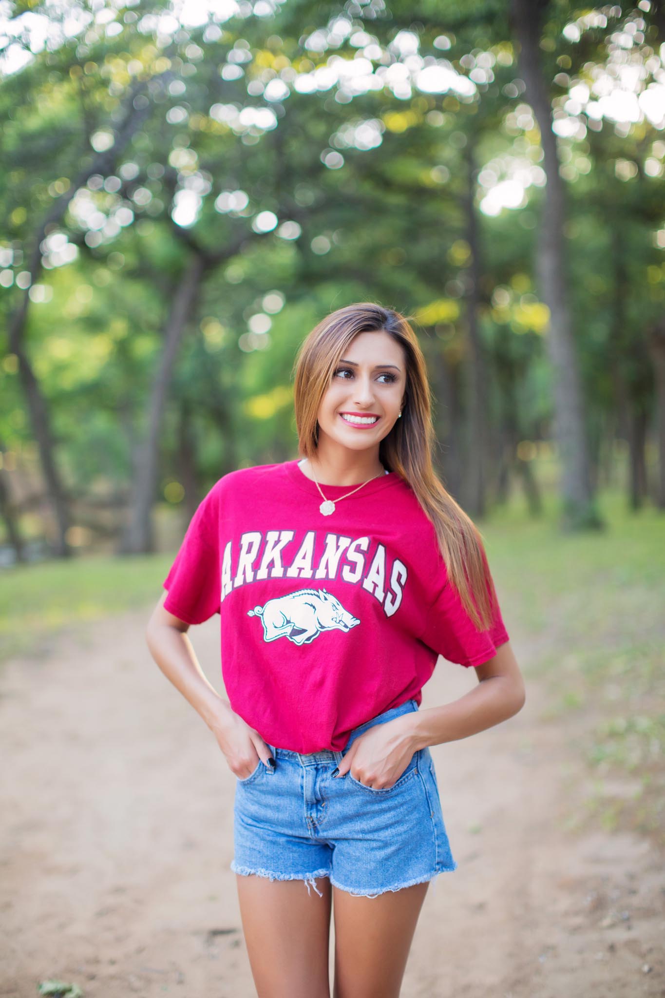 Girl wearing Arkansas college shirt