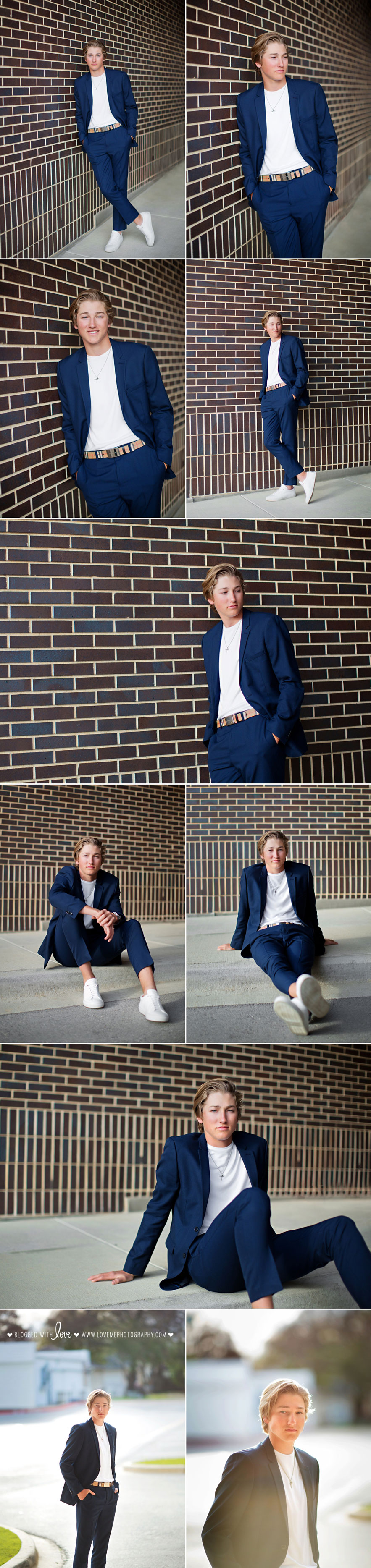Photography session of senior wearing navy jacket and white shoes against brick background